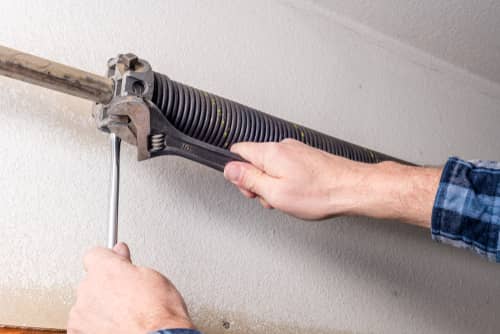 tightening garage door spring